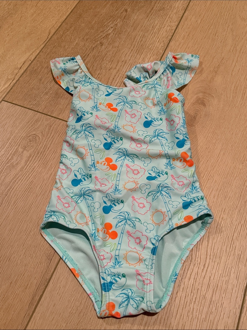 Girl's Disney Light Aqua Tropical Print One-Piece Swimsuit. No flaws.
